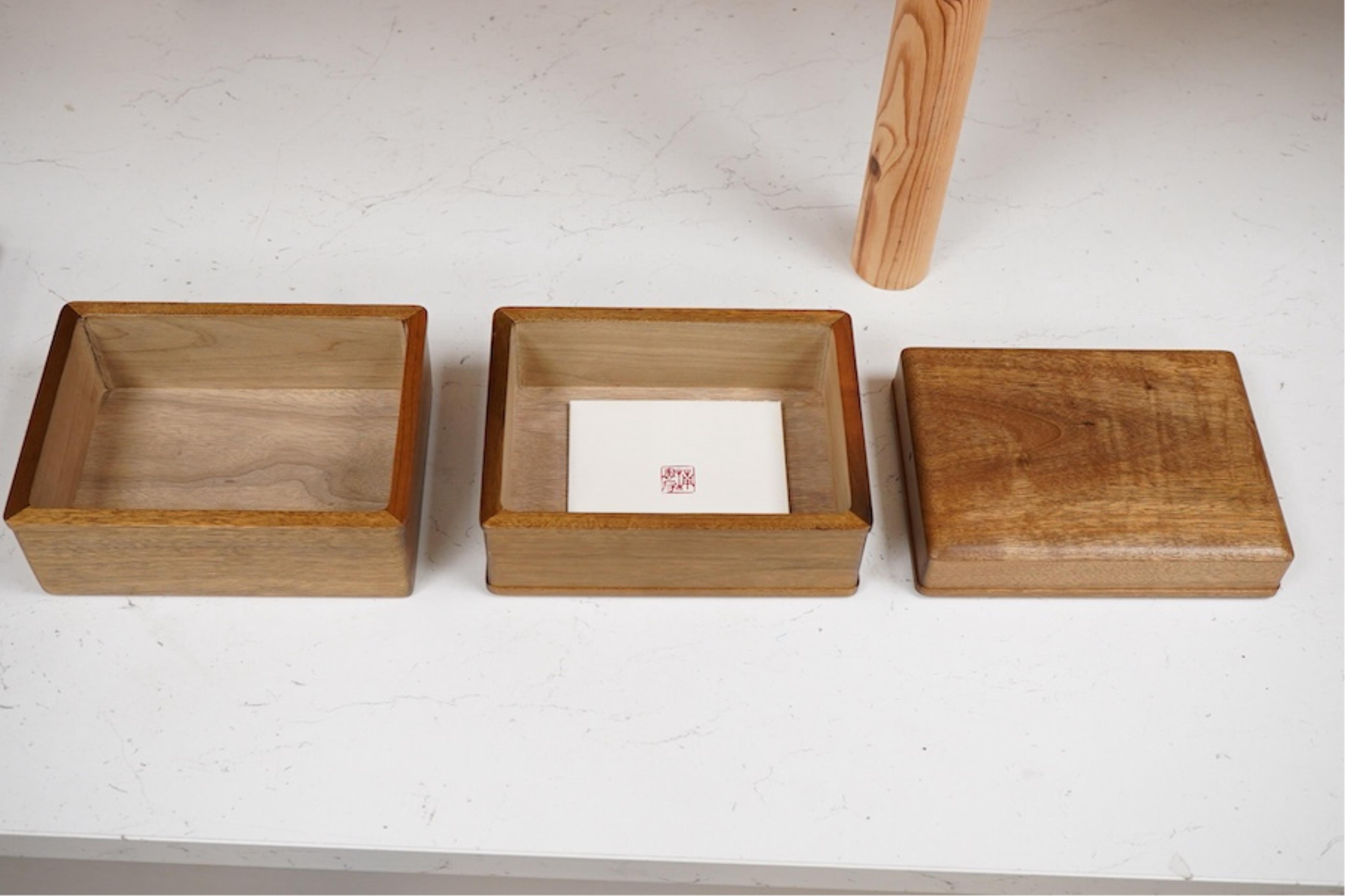 A Chinese three sectioned incense case, a two door fitted cabinet- 29cm high and a sliding topped box